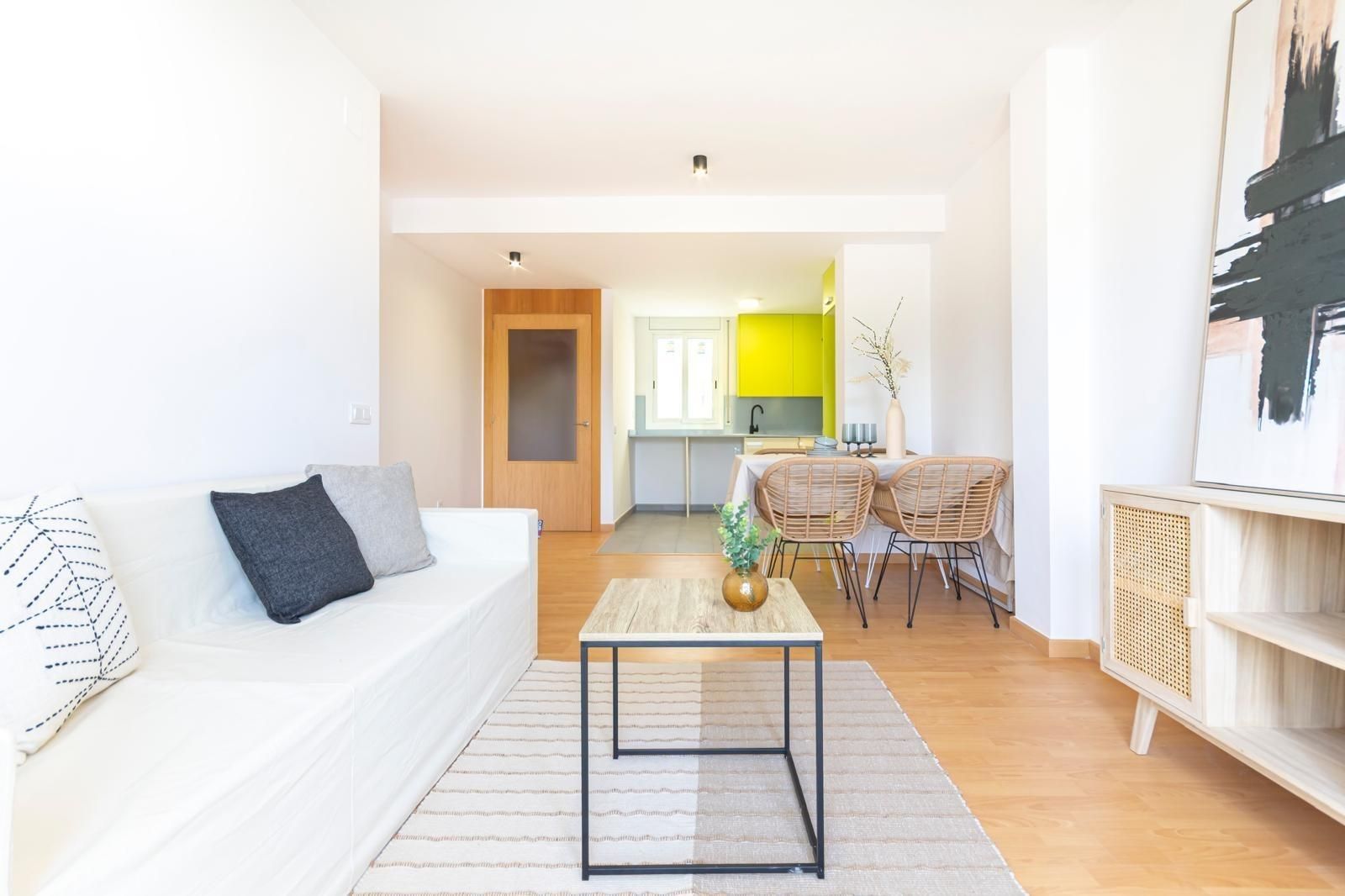 Living room of Planta baja for sale in Sant Martí Sarroca  with Parquet flooring, Terrace and Community pool