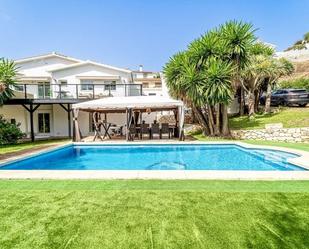 Swimming pool of House or chalet for sale in  Sevilla Capital  with Air Conditioner