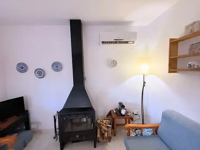 Sala d'estar de Casa o xalet en venda en L'Escala amb Aire condicionat, Calefacció i Terrassa