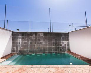 Swimming pool of Single-family semi-detached for sale in Fuente Palmera  with Air Conditioner, Terrace and Swimming Pool