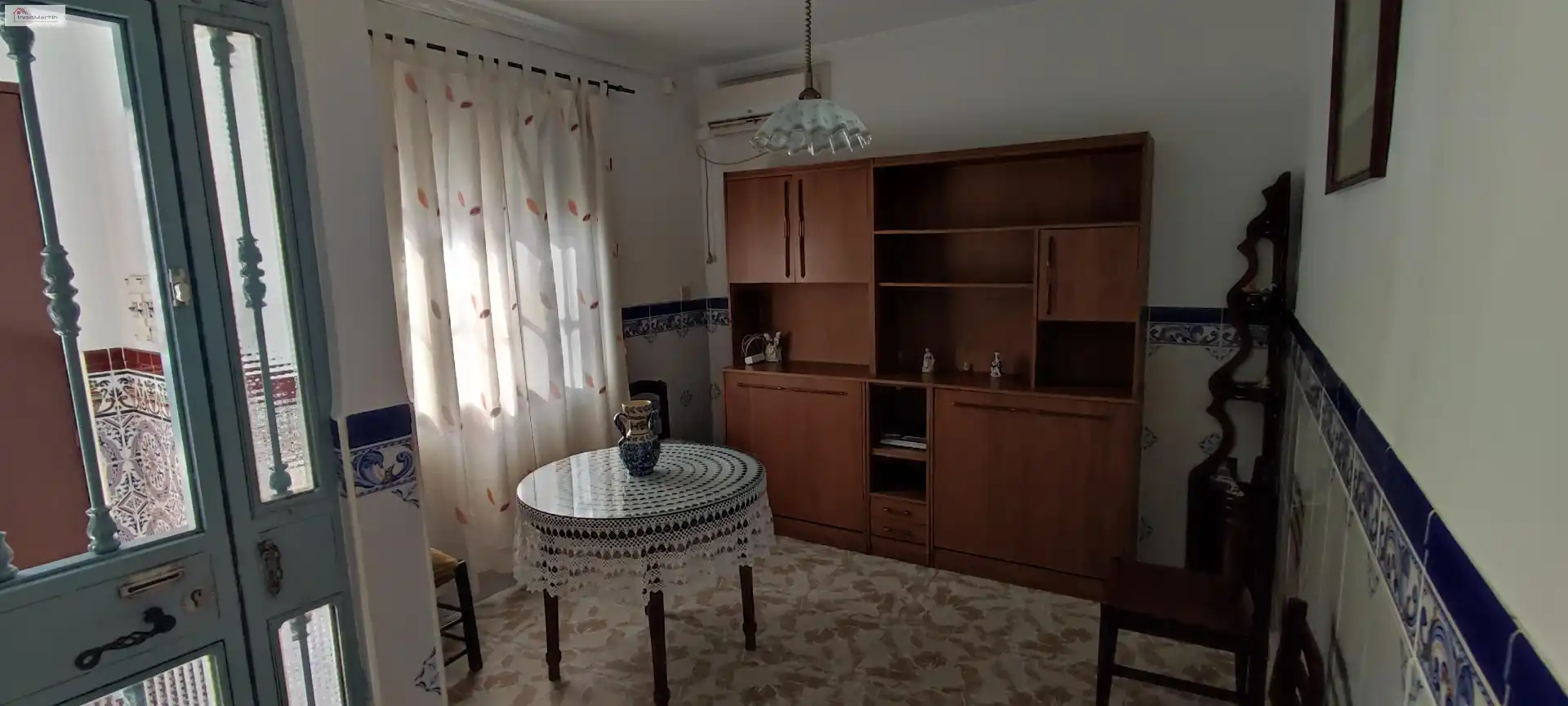 Sala de estar de Casa adosada en venta en Alcalá del Río con Aire acondicionado, Terraza y Trastero