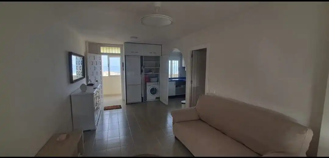 Sala de estar de Apartamento de alquiler en La Manga del Mar Menor con Calefacción, Piscina y Amueblado