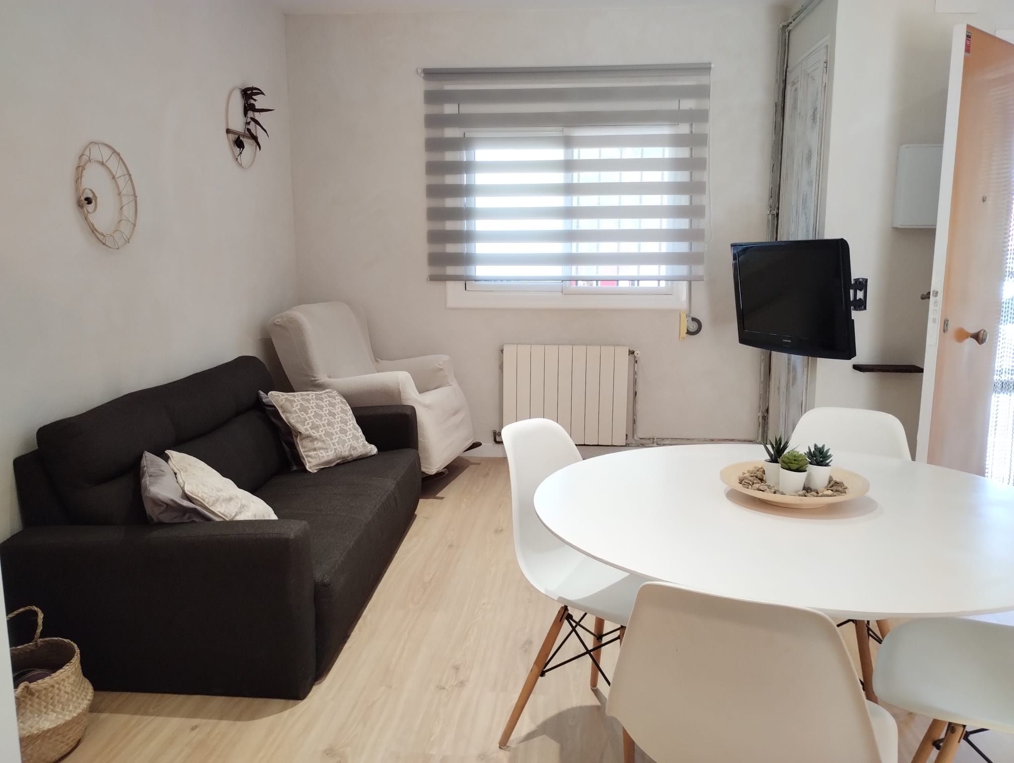 Sala d'estar de Casa adosada de lloguer en  Barcelona Capital amb Calefacció, Parquet i Terrassa