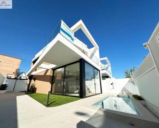 Exterior view of House or chalet for sale in Pilar de la Horadada  with Air Conditioner, Heating and Private garden