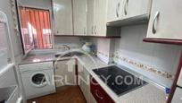 Kitchen of Apartment for sale in Chiclana de la Frontera  with Air Conditioner, Private garden and Community pool