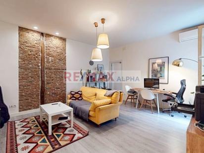 Living room of Flat for sale in  Madrid Capital