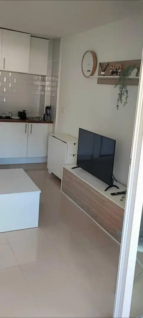 Sala de estar de Estudio en venta en Benalmádena con Aire acondicionado y Piscina comunitaria