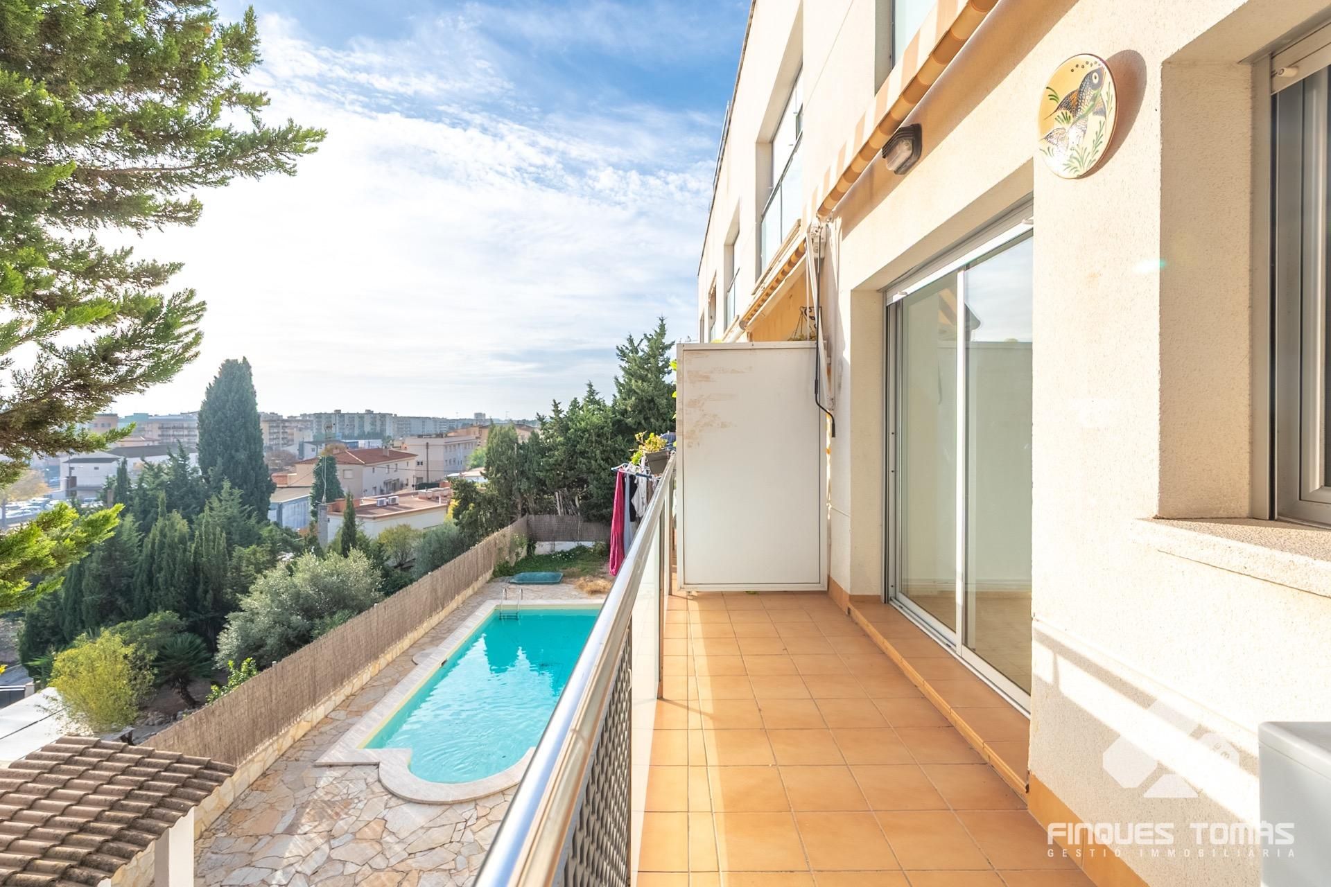 Swimming pool of Planta baja for sale in Calafell  with Air Conditioner, Terrace and Storage room