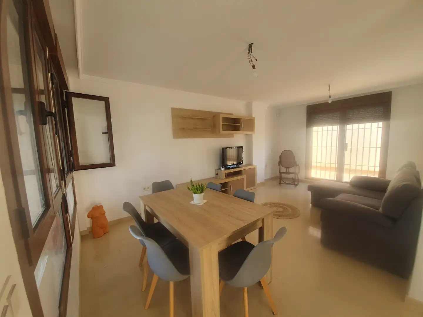 Sala d'estar de Casa adosada en venda en Guadix amb Terrassa, Traster i Moblat