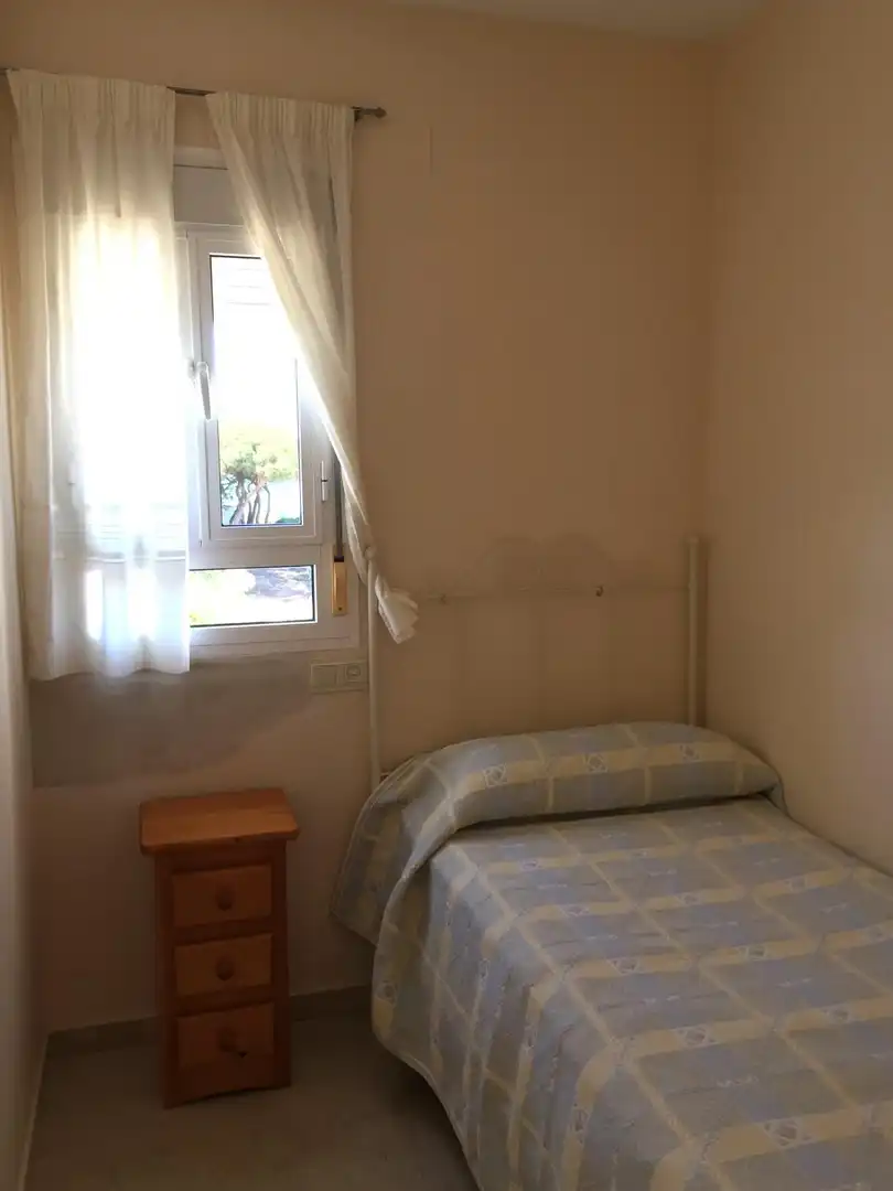 Habitación de Piso de alquiler en El Portil con Jardín privado, Terraza y Piscina
