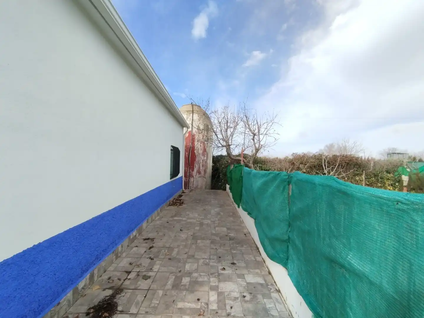 Vista exterior de Finca rústica en venda en Tomelloso amb Aire condicionat, Jardí privat i Piscina