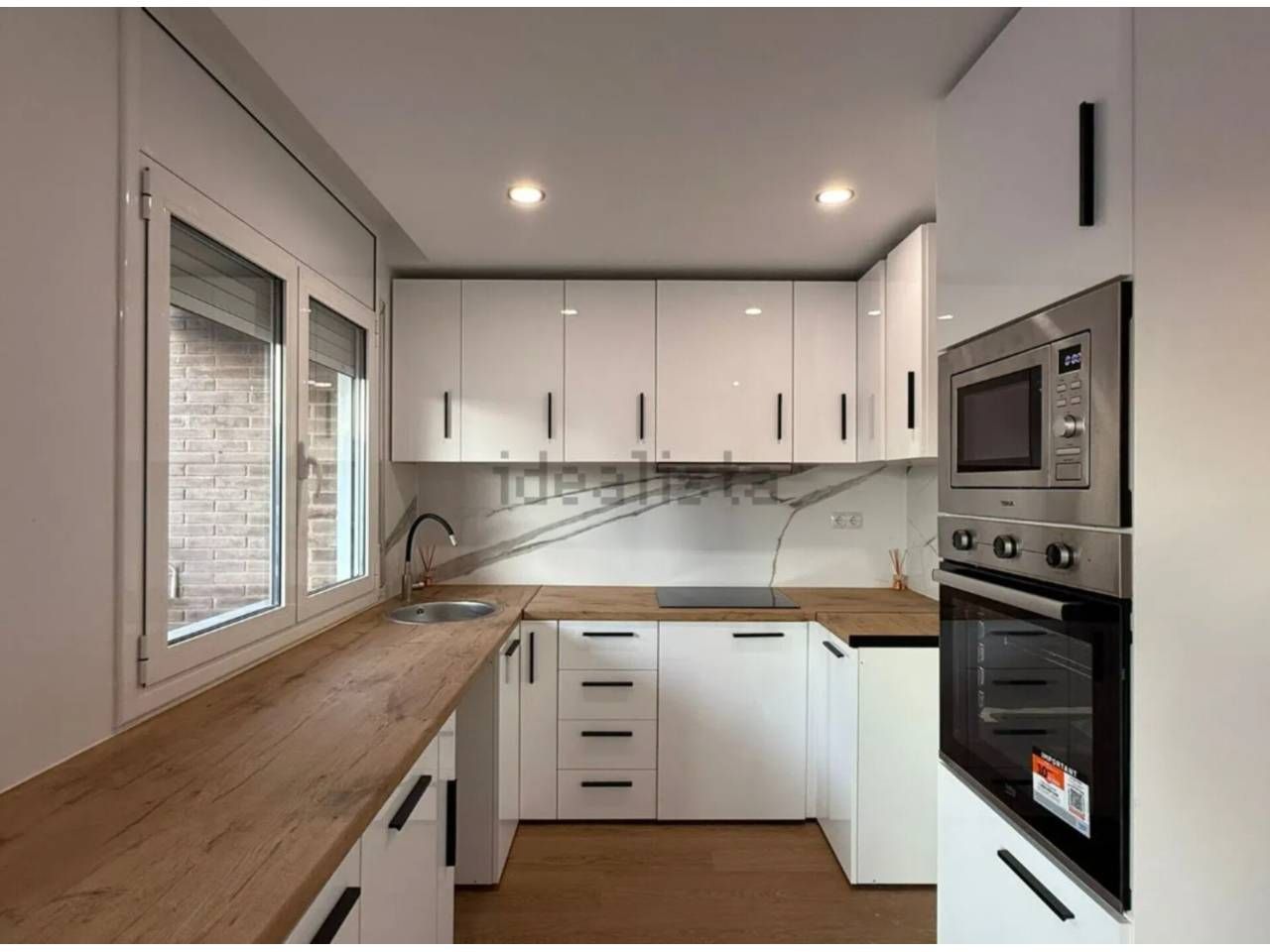 Kitchen of Attic for sale in Rubí  with Heating, Parquet flooring and Balcony