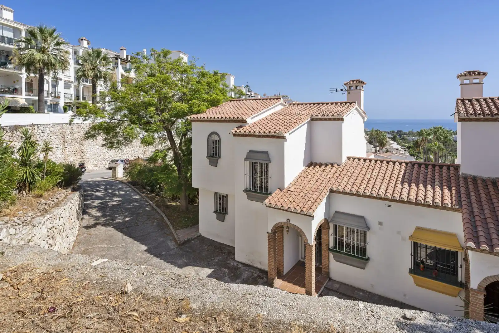 Vista exterior de Casa adosada en venta en Mijas con Aire acondicionado, Terraza y Trastero