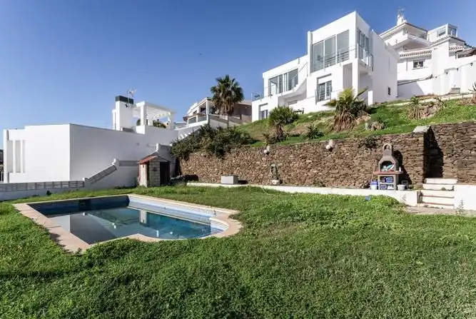 Vista exterior de Casa o chalet en venta en Mijas con Aire acondicionado, Calefacción y Jardín privado