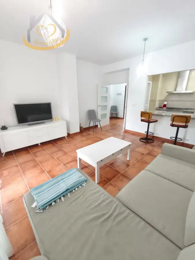 Sala de estar de Apartamento en venta en El Rompido con Aire acondicionado, Terraza y Amueblado