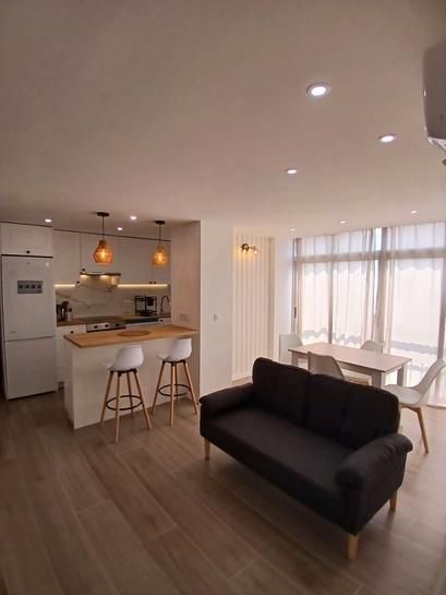 Kitchen of Apartment for sale in Benidorm  with Air Conditioner, Private garden and Parquet flooring