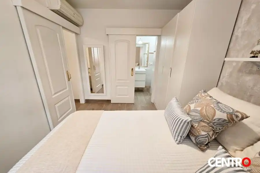 Dormitori de Apartament de lloguer en Granada amb Aire condicionat
