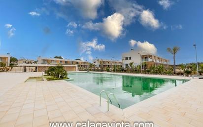 Piscina de Casa adosada en venda en Campos amb Aire condicionat, Calefacció i Jardí privat