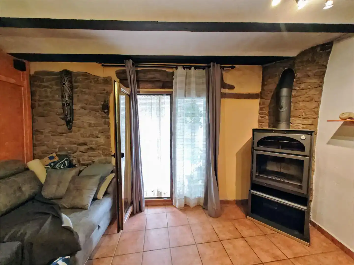 Sala d'estar de Casa adosada en venda en Xert amb Aire condicionat i Balcó