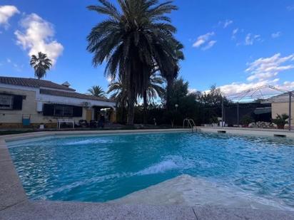 Swimming pool of House or chalet for sale in La Rinconada  with Air Conditioner, Heating and Swimming Pool