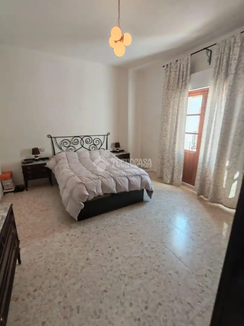 Dormitori de Casa adosada en venda en Marchena amb Aire condicionat
