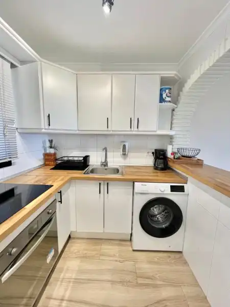 Kitchen of Flat for sale in Mijas  with Air Conditioner, Terrace and Swimming Pool