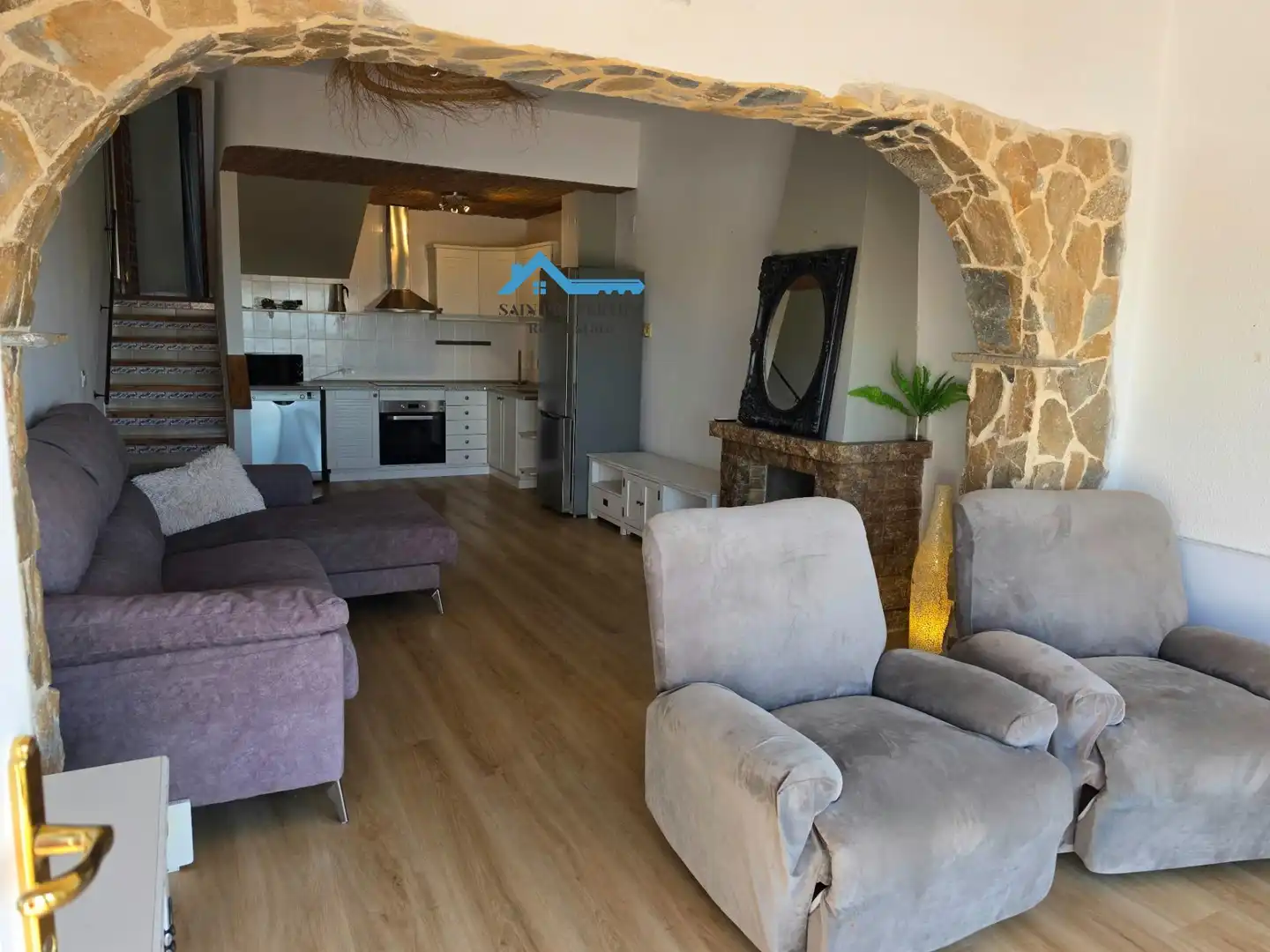 Sala d'estar de Casa adosada en venda en Escandinavia - Cautivador