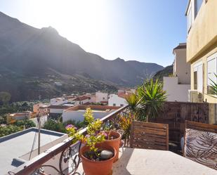 Vista exterior de Casa o xalet en venda en Mogán amb Aire condicionat, Jardí privat i Terrassa