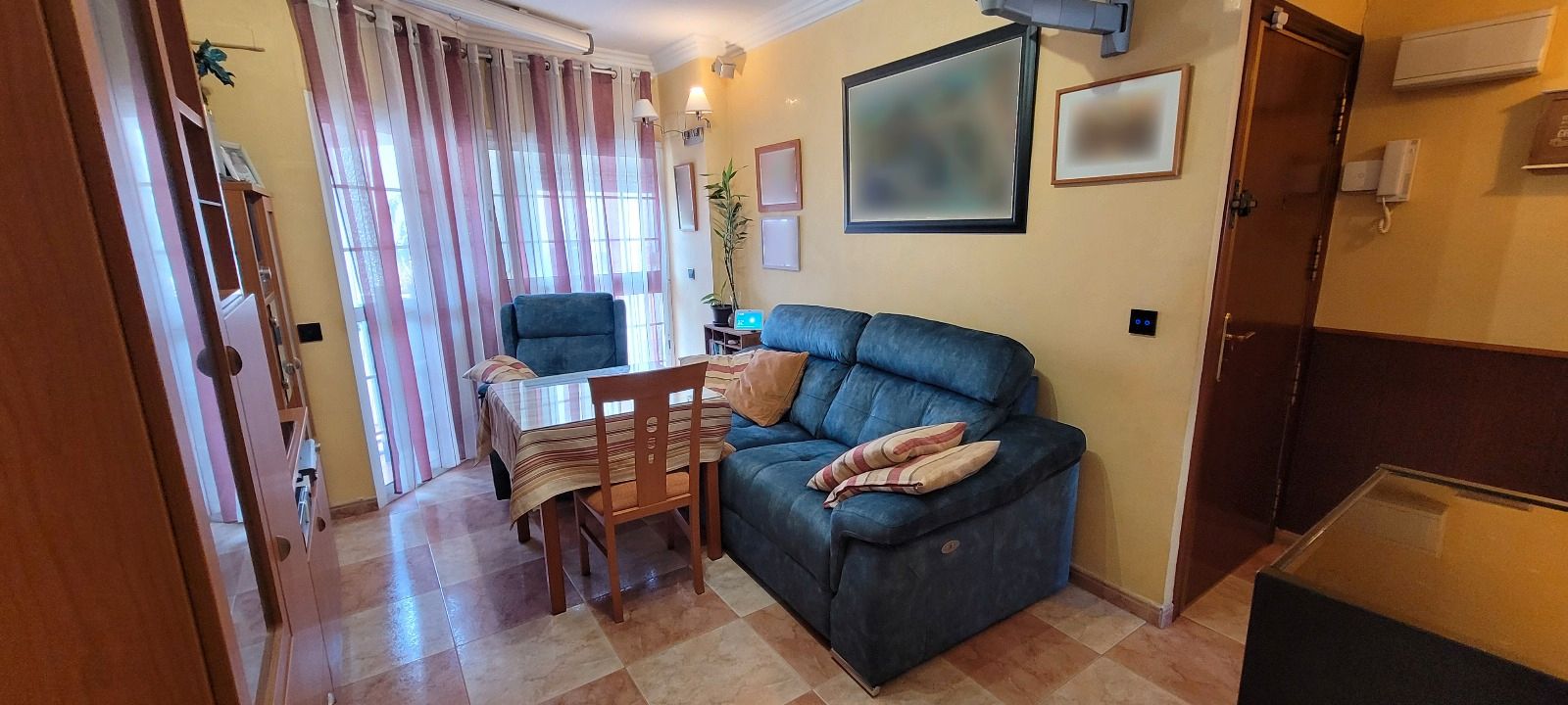 Sala d'estar de Pis en venda en  Sevilla Capital amb Aire condicionat, Terrassa i Moblat