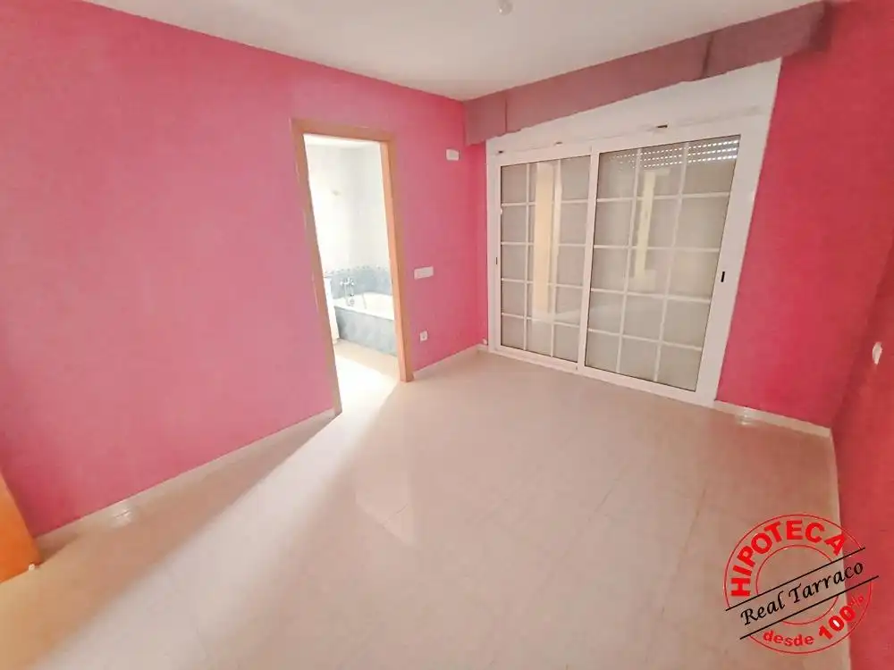 Habitación de Casa adosada en venta en Calafell con Piscina comunitaria