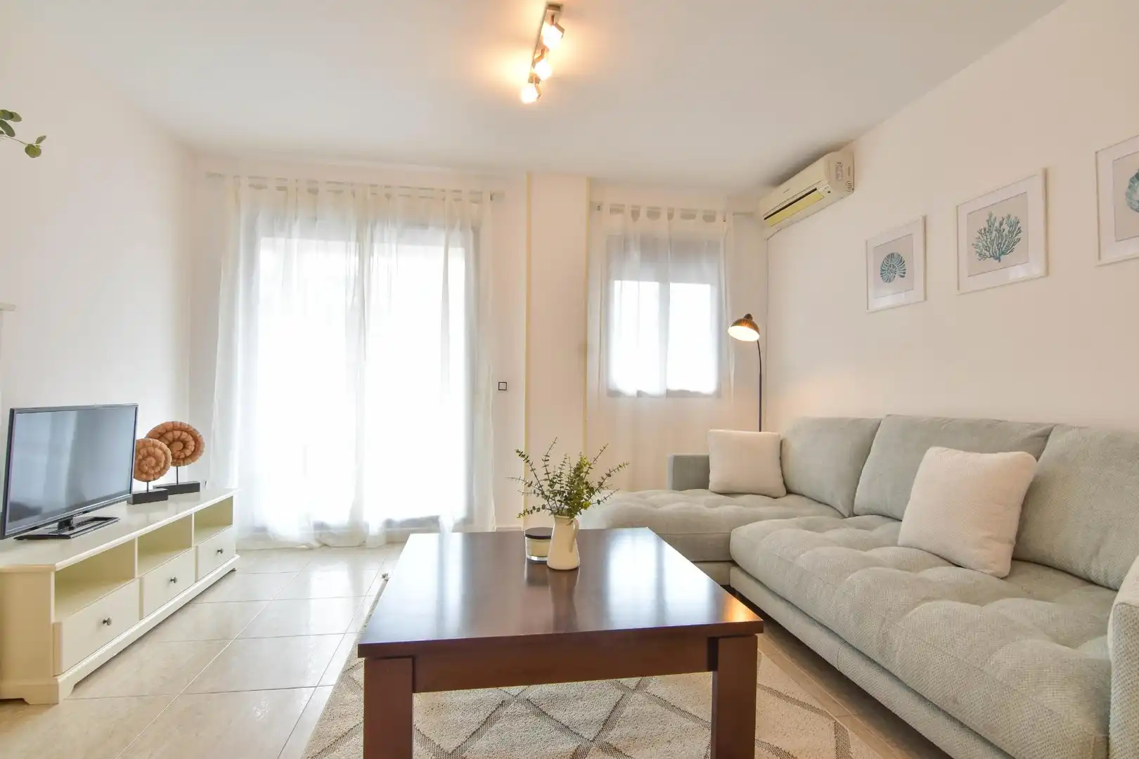 Sala de estar de Piso de alquiler en Puçol con Aire acondicionado, Jardín privado y Terraza
