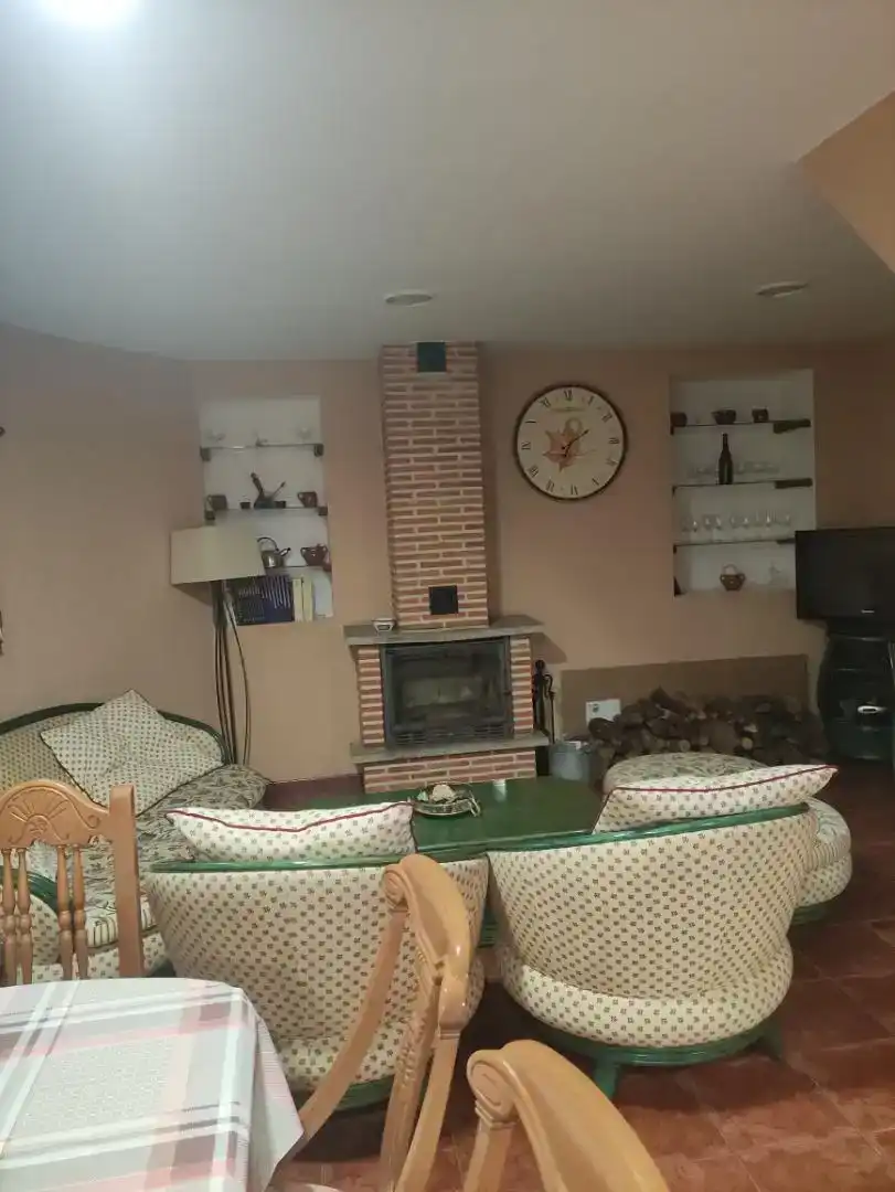 Sala de estar de Casa adosada en venta en Igüeña con Amueblado