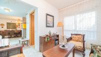 Sala d'estar de Casa adosada en venda en Torrelodones amb Aire condicionat, Terrassa i Piscina