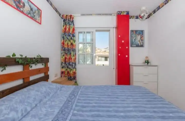 Habitación de Casa adosada de alquiler en Benalmádena con Aire acondicionado, Terraza y Amueblado