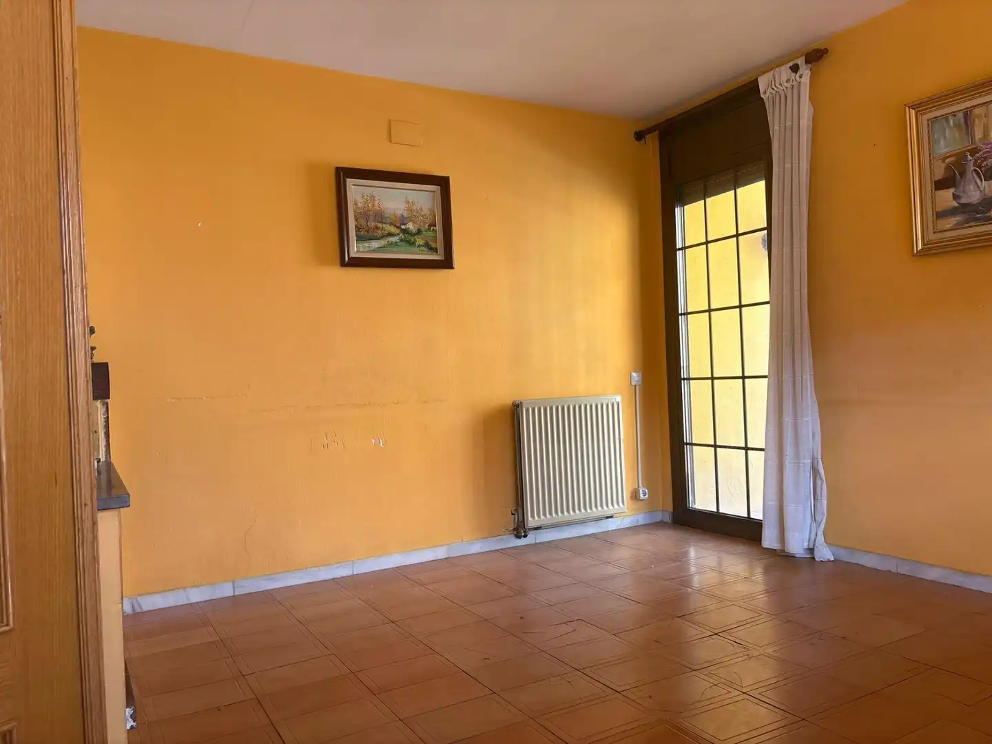 Sala de estar de Casa adosada en venta en Sant Celoni con Calefacción, Jardín privado y Terraza