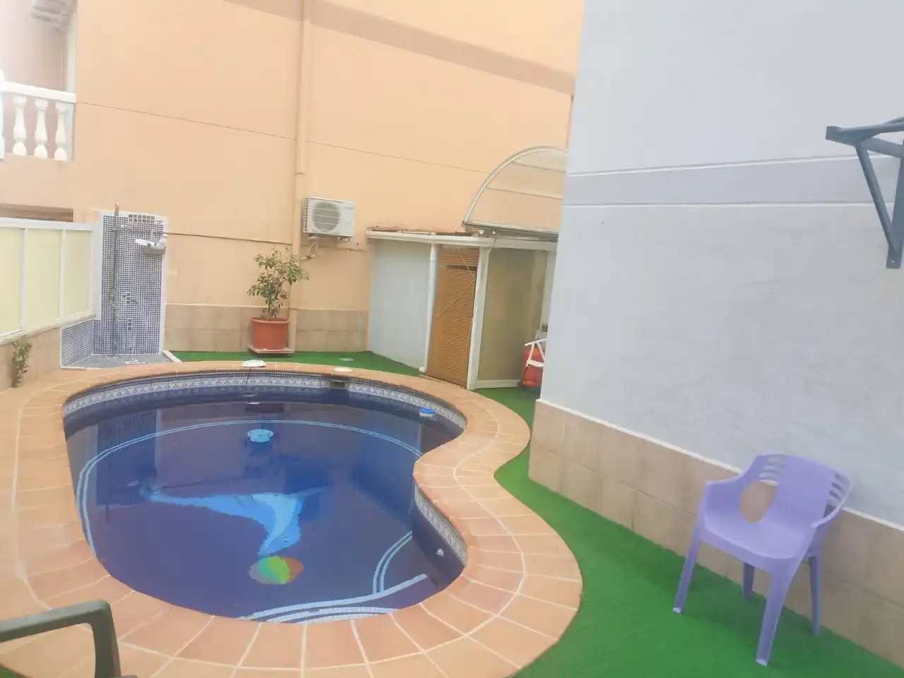 Piscina de Casa adosada en venda en Oliva amb Aire condicionat, Calefacció i Jardí privat