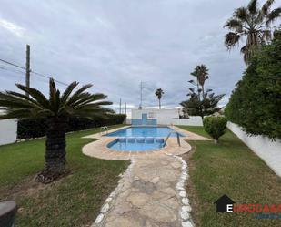 Swimming pool of Single-family semi-detached for sale in Vinaròs  with Air Conditioner, Private garden and Terrace