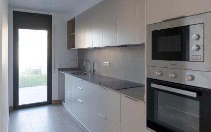 Kitchen of Single-family semi-detached for sale in Cassà de la Selva  with Air Conditioner and Terrace