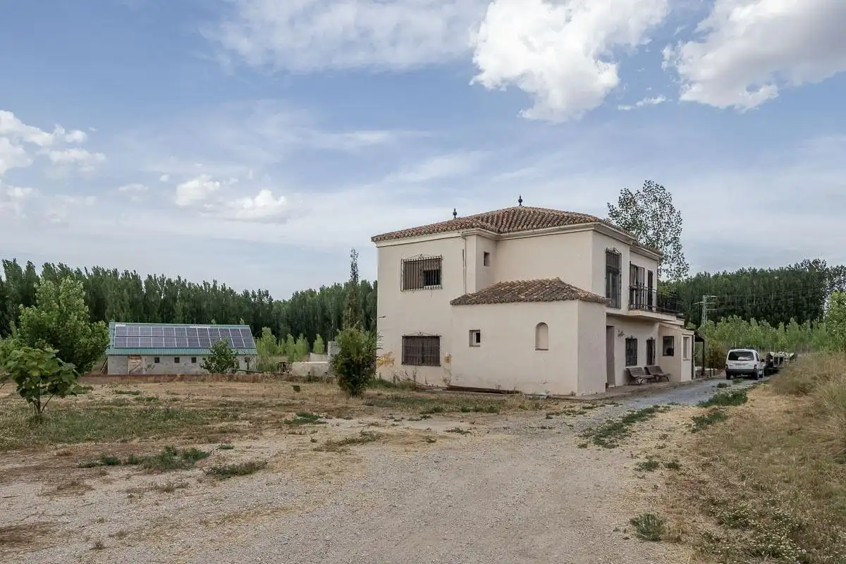 Vista exterior de Finca rústica en venda en Purullena amb Jardí privat, Terrassa i Traster