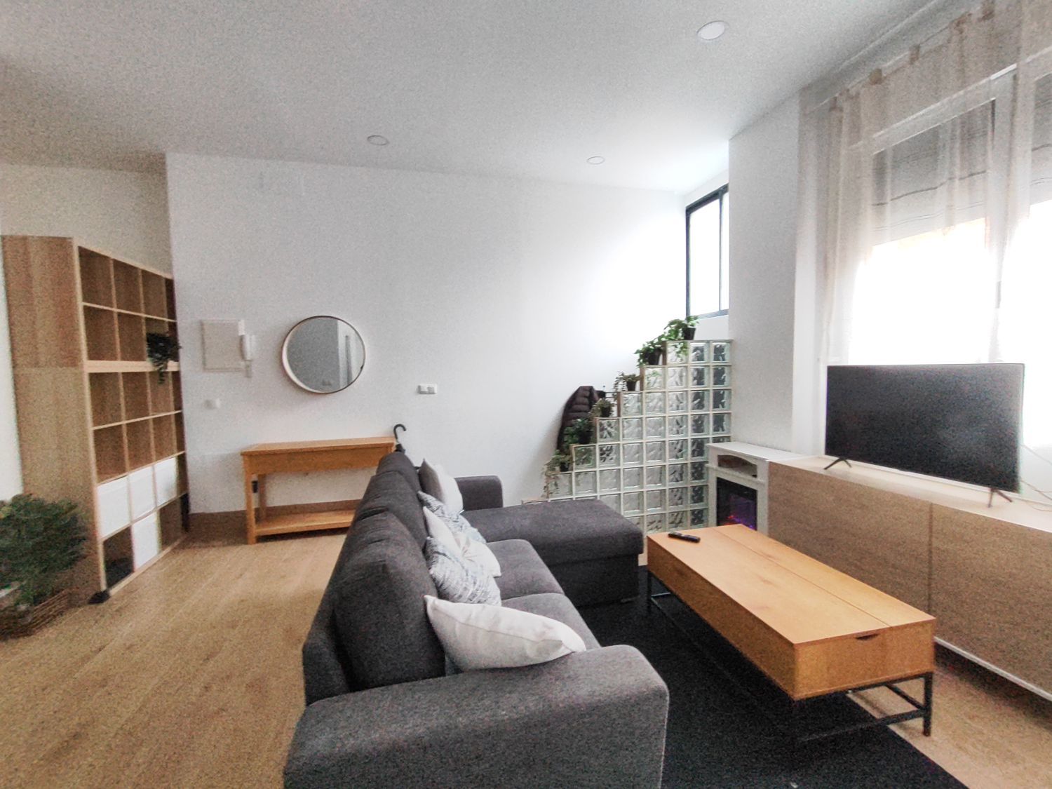 Sala de estar de Apartamento de alquiler en  Huelva Capital con Aire acondicionado y Amueblado