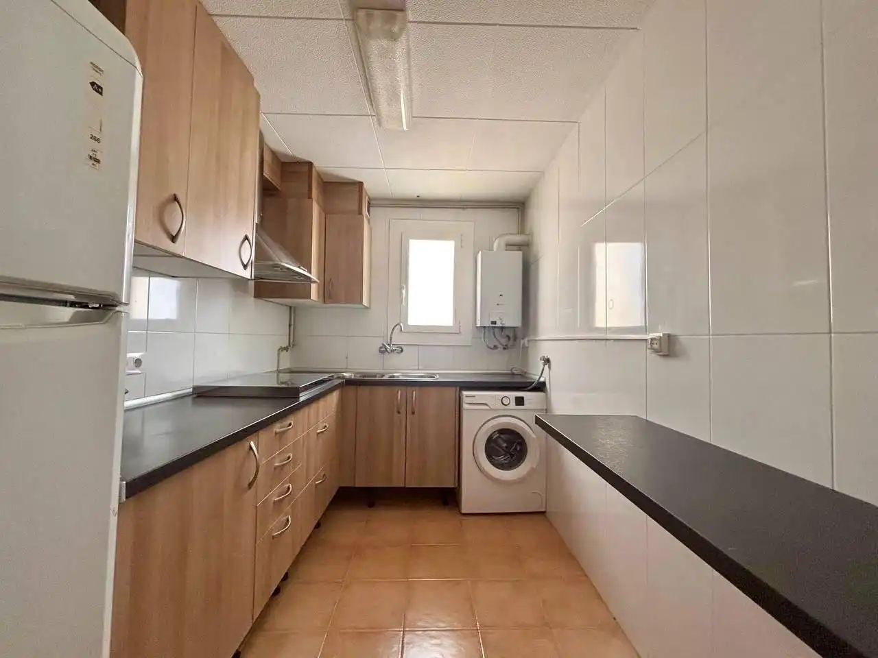 Küche von Wohnung zum Verkauf in Montgat mit Klimaanlage und Terrasse