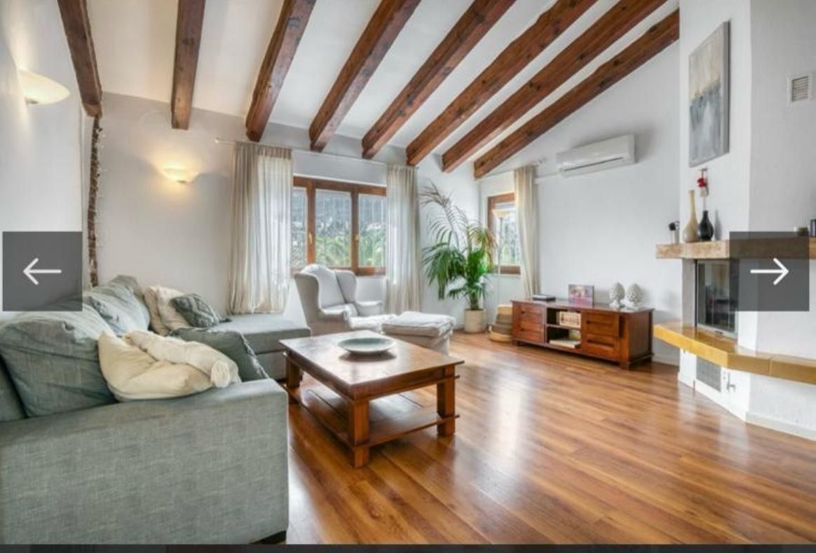 Sala d'estar de Casa adosada en venda en Dénia amb Aire condicionat i Piscina comunitària