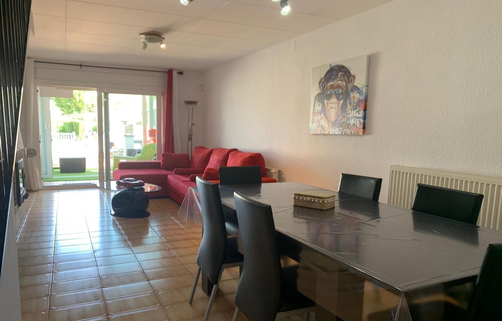 Menjador de Casa adosada en venda en Empuriabrava amb Aire condicionat, Calefacció i Jardí privat