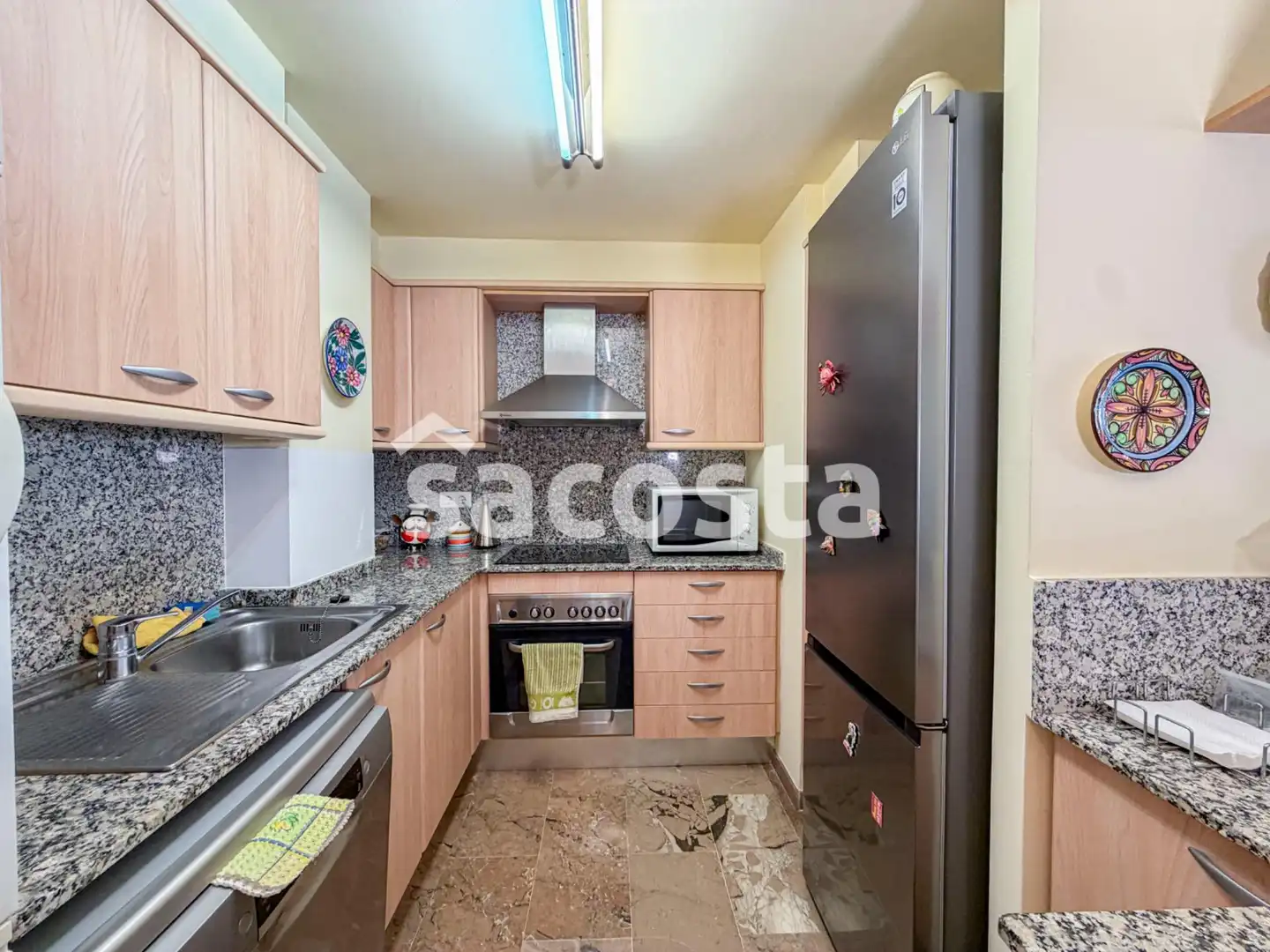 Kitchen of Flat for sale in Lloret de Mar  with Air Conditioner, Heating and Private garden