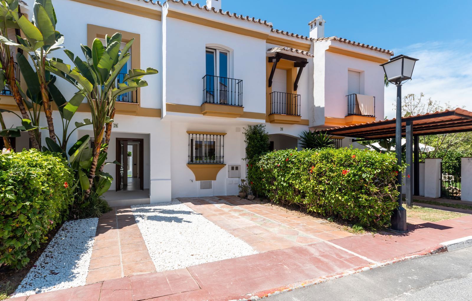 Exterior view of Single-family semi-detached for sale in Estepona  with Air Conditioner, Terrace and Storage room