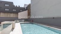 Swimming pool of Attic for sale in  Madrid Capital  with Air Conditioner, Terrace and Swimming Pool