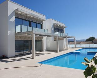 Exterior view of Single-family semi-detached for sale in Moraira  with Air Conditioner, Terrace and Swimming Pool
