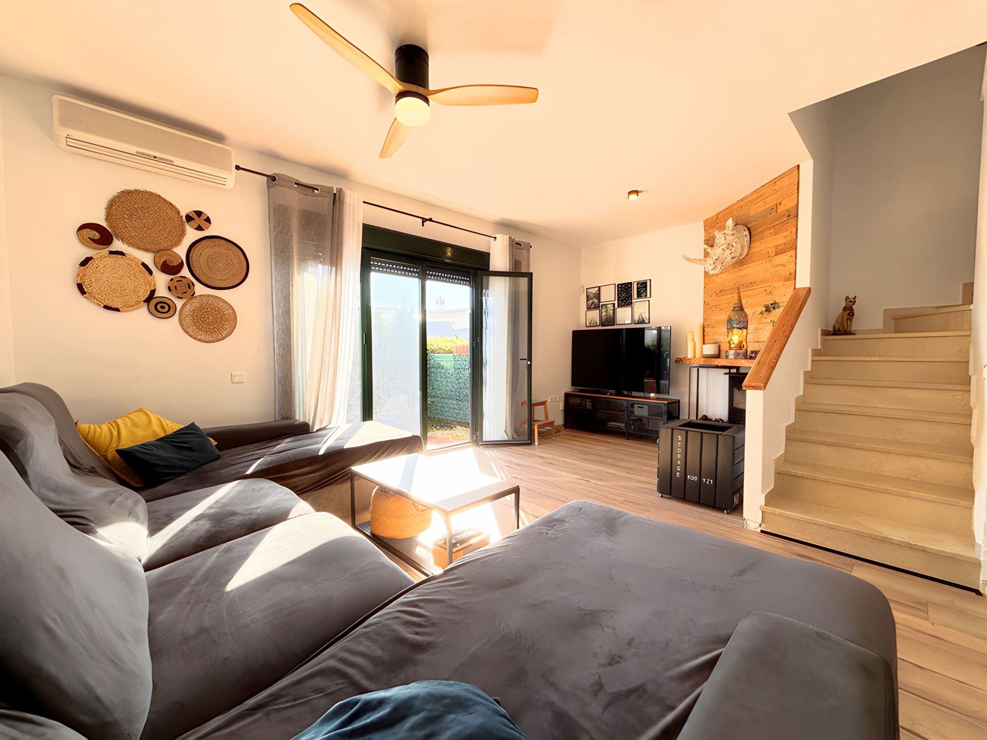 Sala d'estar de Casa adosada en venda en Manilva amb Aire condicionat, Calefacció i Terrassa