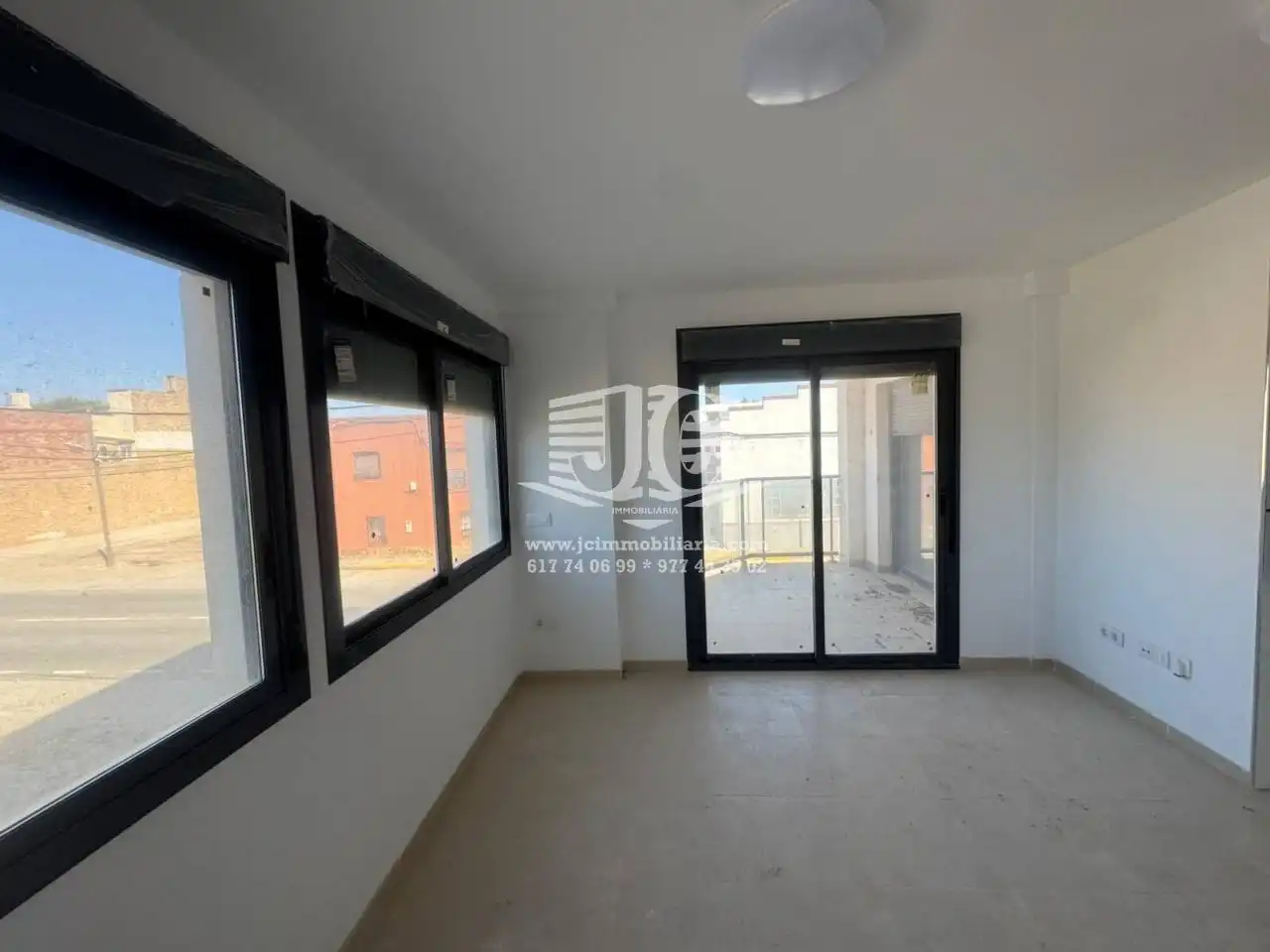 Exterior view of Flat for rent in L'Aldea  with Air Conditioner, Terrace and Storage room