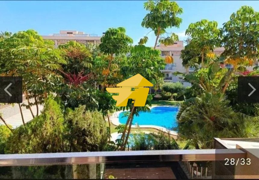 Jardí de Pis de lloguer en Torremolinos amb Aire condicionat, Jardí privat i Piscina